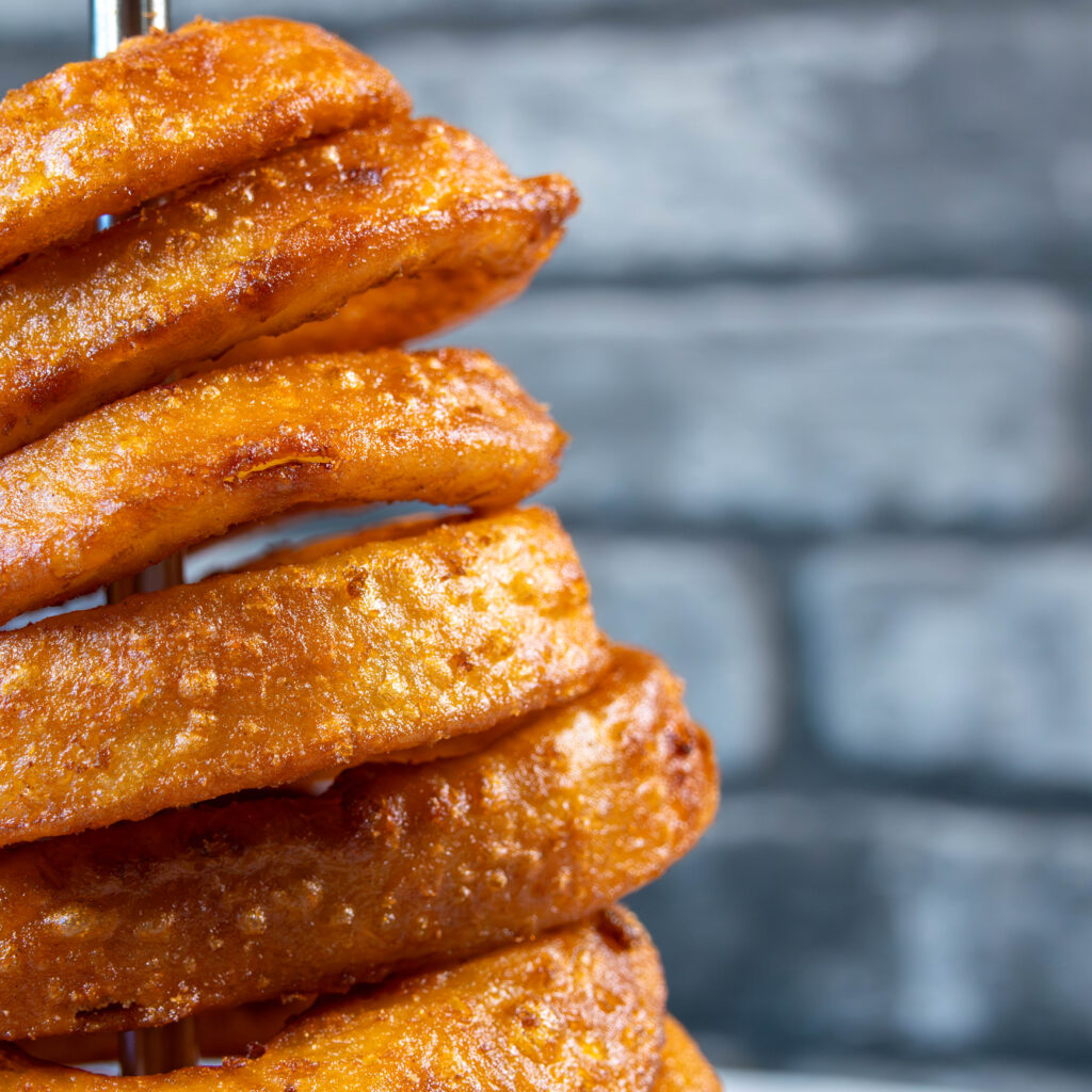 Stack of onion rings on skewer