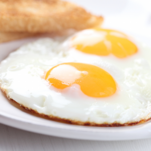 Sunnyside up eggs with toast