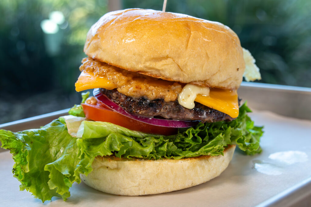 Cheeseburger with lettuce and tomatoe